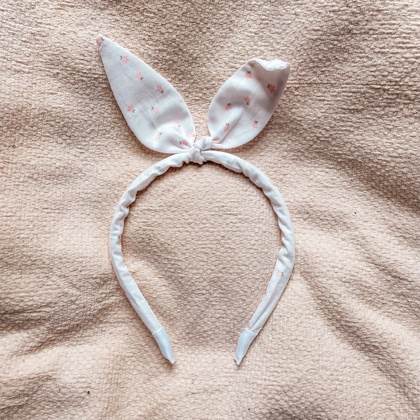 Oreilles de lapin petite fleur rose