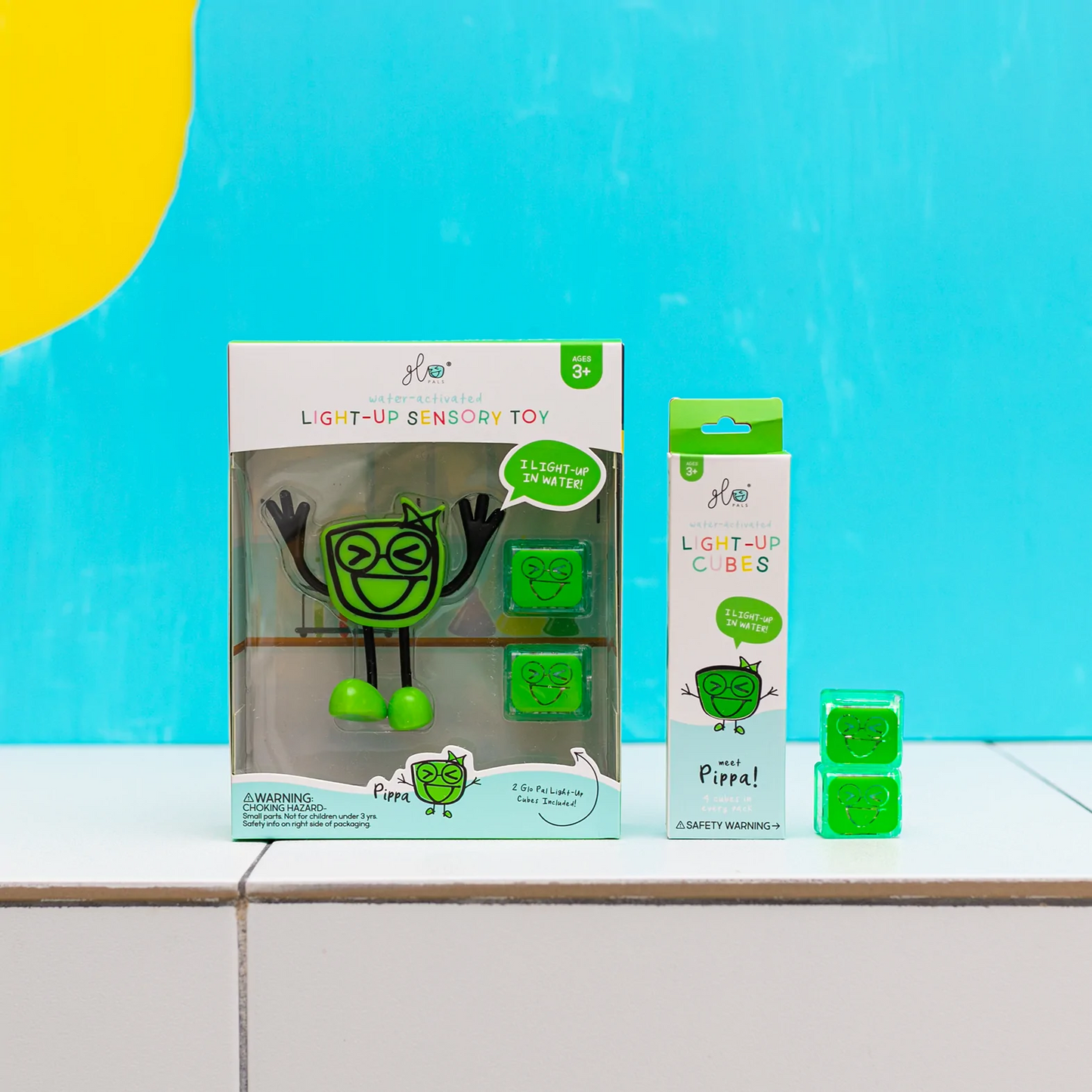 Glo Pals - Jouet avec 2 cubes lumineux activés par l'eau, Pippa