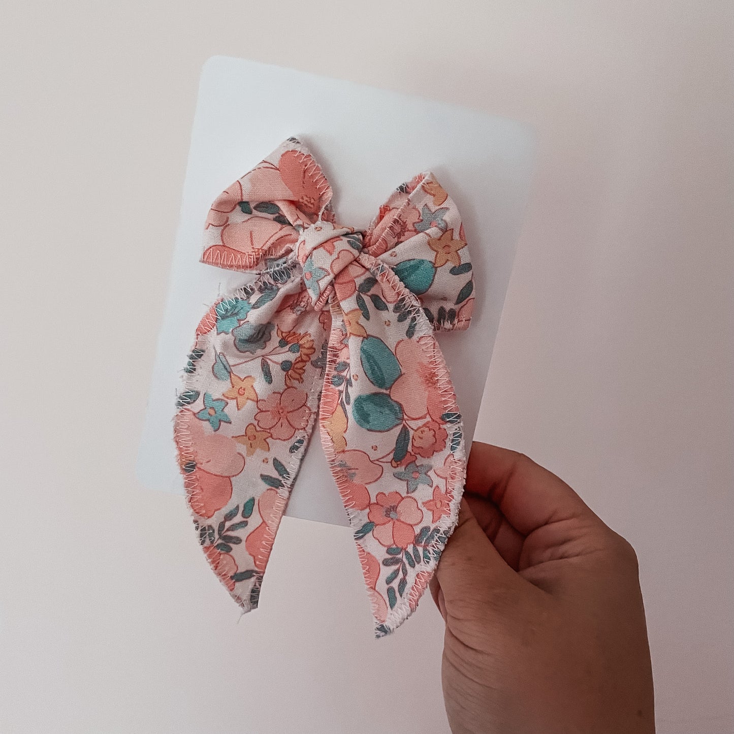boucle ruban fleur rose