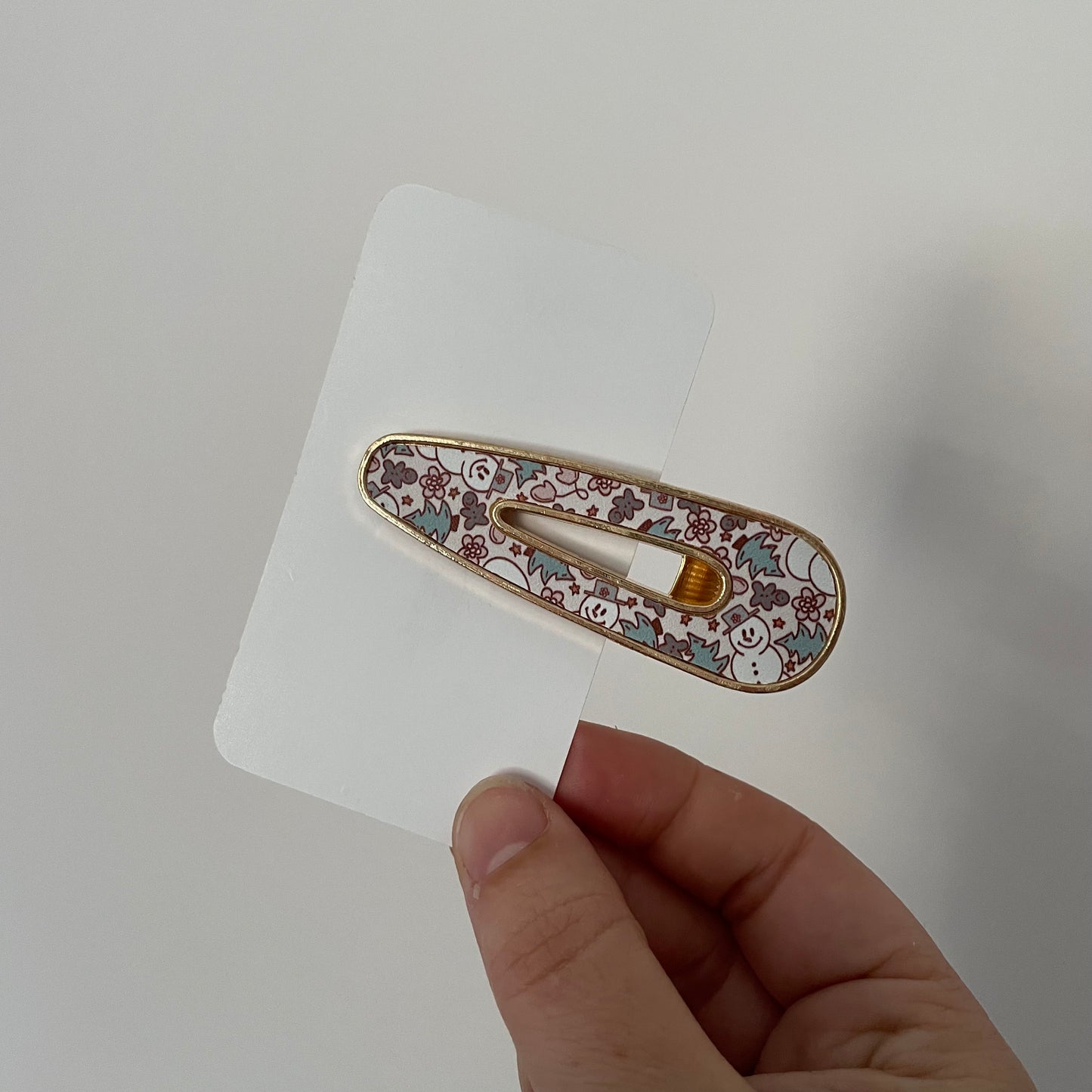 Clip métal à motif