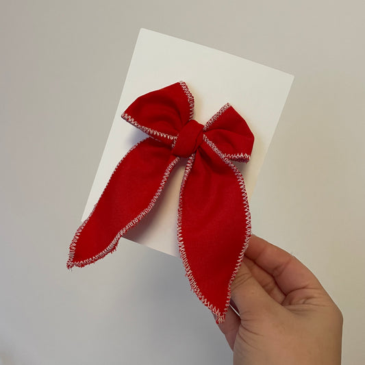 Boucle ruban rouge