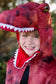 CAPE T-REX GRANDASAURUS ROUGE ET NOIRE AVEC GRIFFES 4-6 ans